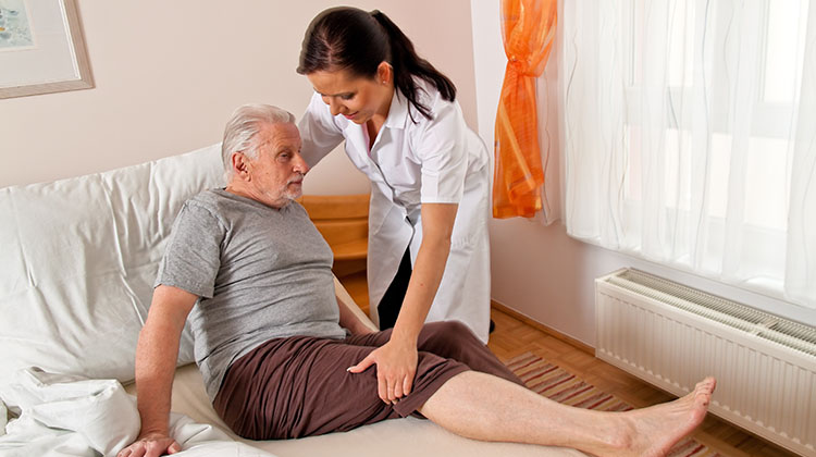 Care Worker Helping Senior